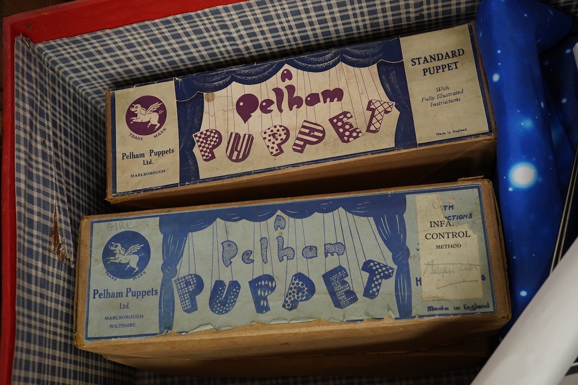 A Pelham Puppet related collection, including four boxed puppets; an Ostrich, a Type SS Clown, a Dutch Girl, a Girl, an oriental lady in a related box, a Junior Pelham Ostrich, together with a number of other marionettes